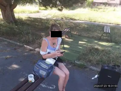žena